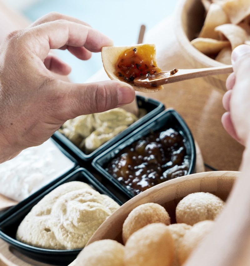 Chef preparing a tasting menu on board a classic sailboat