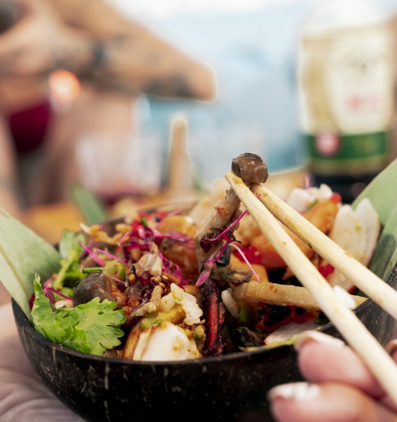 Asian-inspired gourmet dish served during a sailing experience