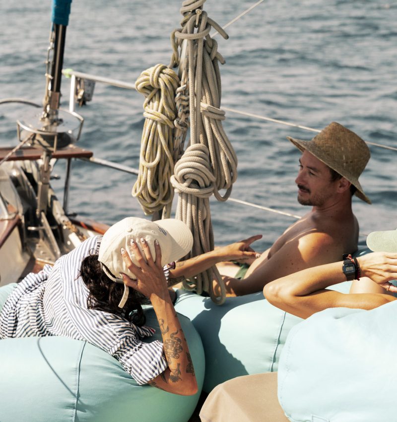 Guests relaxing on board while sailing along the coast of Mallorca