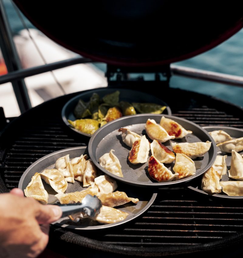 Gourmet food being cooked on board a classic sailboat
