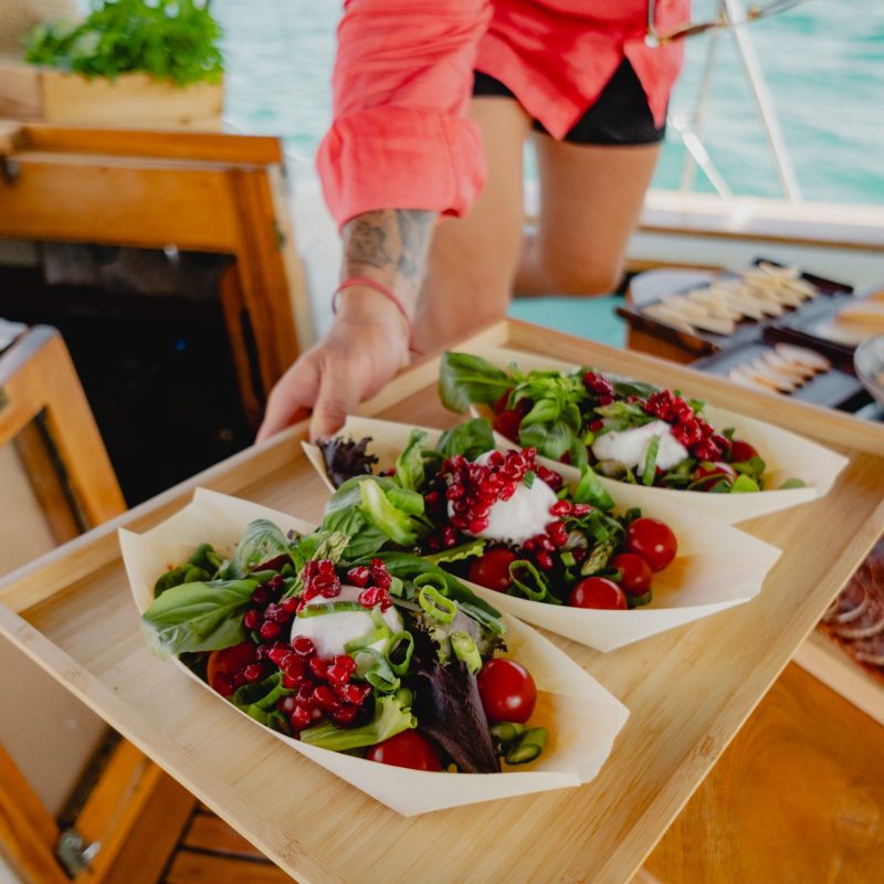 Fresh salad served on board during a sailing experience in Mallorca