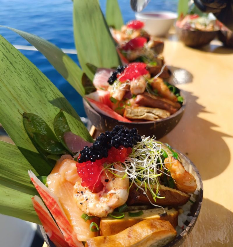 Gourmet appetizer served on board during a sailing experience in Palma de Mallorca