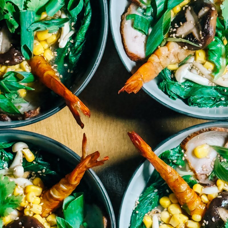 Grilled prawns with greens during a private boat tour Mallorca