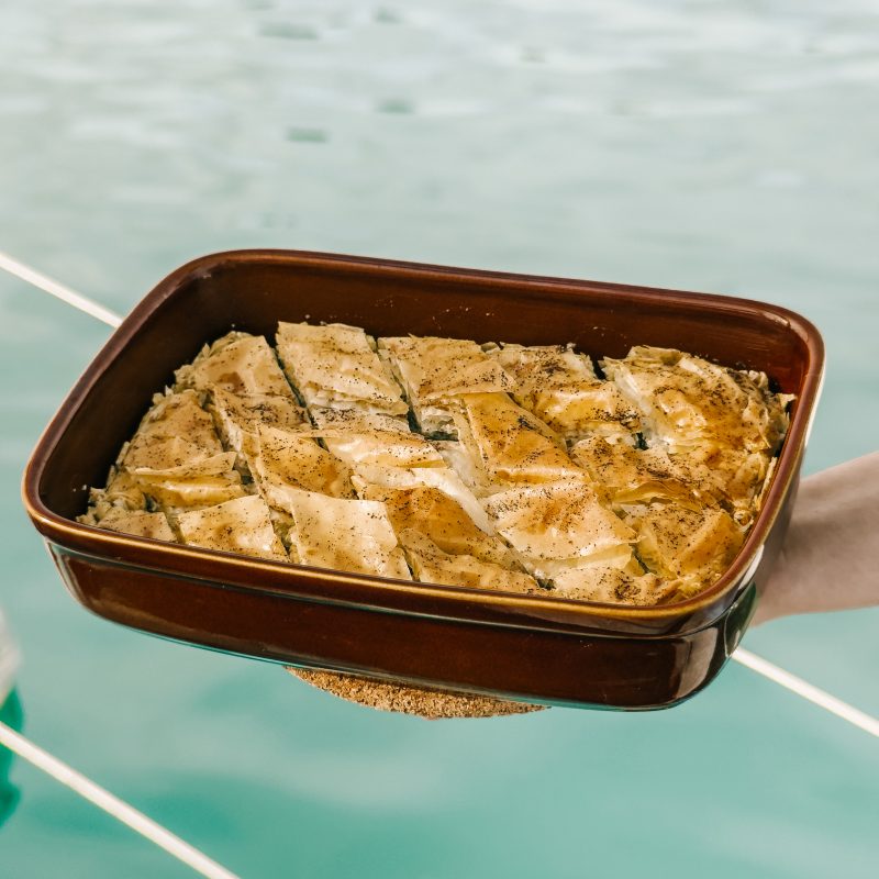 Homemade lasagna enjoyed at sea during a private boat tour Mallorca